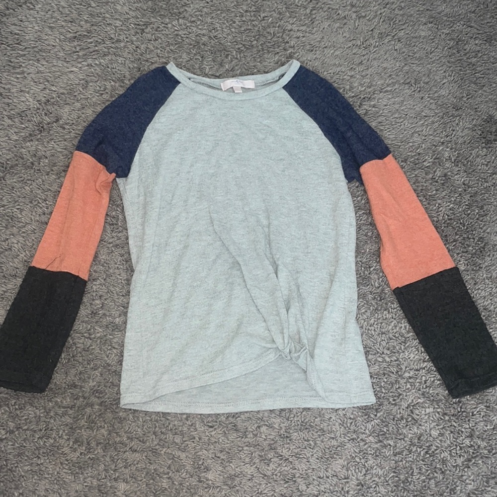 I am selling a kids large long sleeve shirt, from the brand Moa Moa.